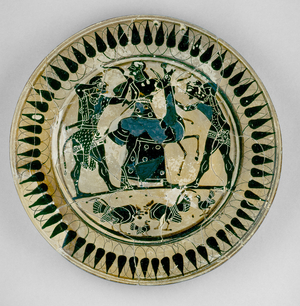 Attic black-figure plate decorated with a scene of Heracles and Apollo fighting over a deer and being separated by Artemis, in the manner of Lydos, from Greece, c.560 BC (ceramic)