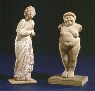 Two fertility statuettes, both females, one of a clothed, elderly woman and one of a nude fat one (ceramic)