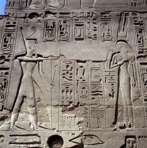 Karnak: Temple of Amon Walls - Ramses before the deities