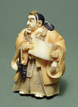 Netsuke of a Priest (ivory)