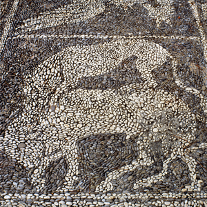 Panther attacking a bull (stone mosaic)