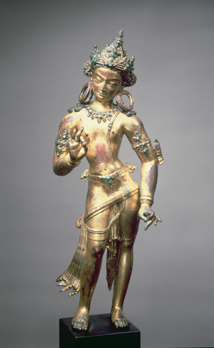 Standing figure of Avaloki, gilded copper inlaid with precious stones