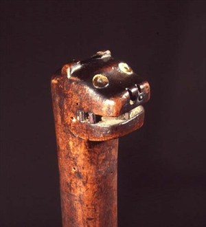 A ball-headed wooden club, from the eastern woodlands of North America
