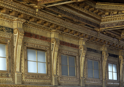 Architecture: view of the Cinquecento room designed by Simone del Pollailo (Il Cronaca, 1454-1508) and redecorated by Giorgio Vasari and his studio (1511-1574). Wall, window and ceiling. Palazzo Vecchio (Palazzo della Signoria) Florence