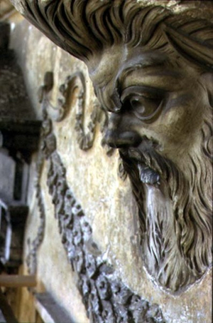 The Rear Facade, detail of antique relief decoration (some pieces from the Ara Pacis of Augustus) depicting the profile of a grotesque face (stone)