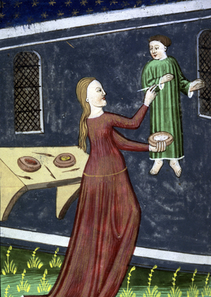 Irene, daughter of Cratinus, painting a picture. "De claris mulieribus" by Boccaccio, Giovanni, early 15th century.