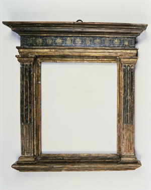 Florentine 15th century carved, gilt and polychrome tabernacle, the unworked canopy cornice above a frieze with painted anthemion decoration, the entablature supported on stop fluted pilasters headed by plain capitals and moulded base, c.1460-80