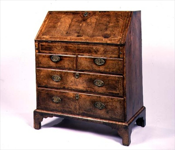 Queen Anne walnut bureau with herringbone banding on bracket feet