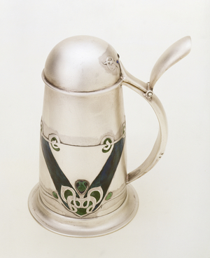 A Liberty and Co. silver and enamel lidded tankard by Archibold Knox, 1900