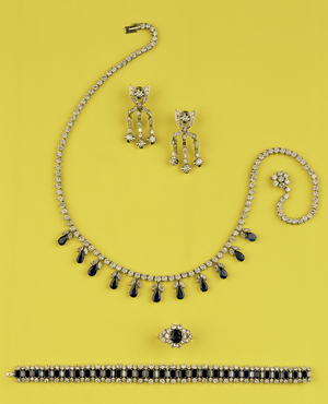 Selection of Art Deco diamond and sapphire jewellery: Art Deco chandelier earrings: fringe necklace; Art Deco sapphire and diamond cluster ring step cut bracelet