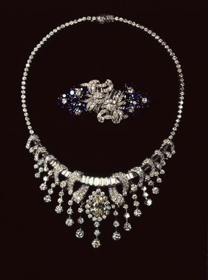 1950's diamond necklace with baguette and brilliant cut diamonds, pave and knife edge set, purchased from Kutchinsky; Sapphire and diamond double clip brooch mounted in platinum