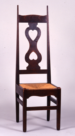 Chair designed by C.F.A. Voysey (1857-1941) in 1898, probably made by C.H.B. Quennell (1872-1935) (oak)