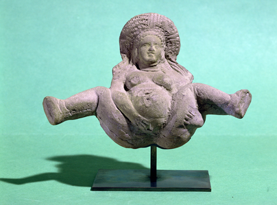 Statuette of a woman giving birth, given to pregnant women for a successful delivery, from Alexandria (terracotta)