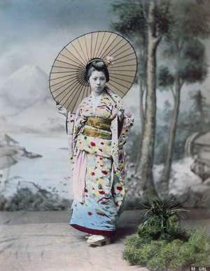 Young Japanese girl in a kimono and with a parasol, Mt.Fuji in the background, c.1900 (coloured photo)