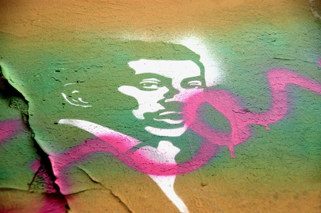 Portrait of Serge Gainsbourg by a fan on the facade of his mansion, rue de Verneuil in the 7th arrondissement of Paris.