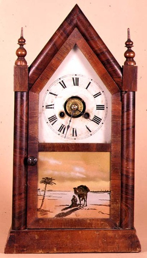 Steeple clock decorated with a print of a desert scene by Jerome and Company, late 19th century