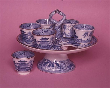 Staffordshire blue-printed egg cups and holder, 'Willow' pattern (ceramic)