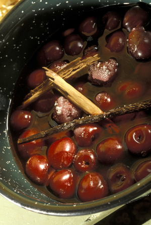 Preparation of cherry jam, Italy