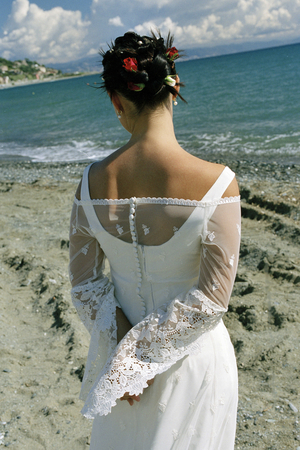 Bride on the beach, Italy