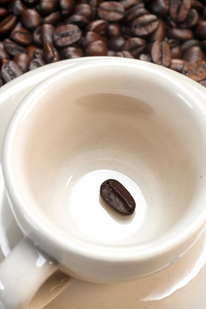 Cup with coffee grain, Italy