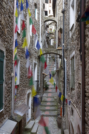 Typical lane called Carugio with stairs and arches, Dolceacqua, Ligury, Italy