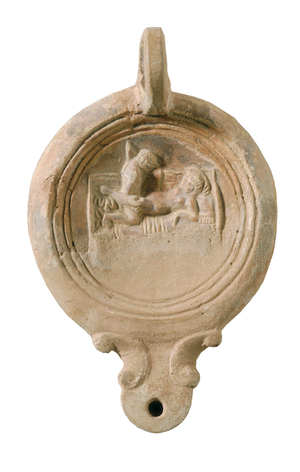 Voluted roman oil lamp with erotic scene. 1st c. A.D (terracotta)