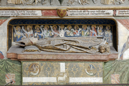 FRANCE. Hauts-de-France. SUM. Amiens. Our Lady Cathedral. South wall of the choir. Tomstone with the statue of bishop Ferry de Beauvoir (died 1473). Gothic Art Sculpture