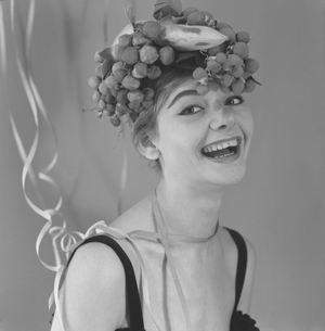 Model wearing a grapefruits hat as a Carnival mask, Venice, 1960 : Fruity Hat