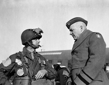 WWII:USAF Base France March 23, 1945: General William Miley (CG of the 17th American Aeroportee Division of the 1st Armee Aeroportee) discusses with Brigadier General Floyd Parks (Chief of Staff of the 1st Armee Aeroportee Alliee)