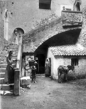 Taormina Sicily (Italy) around 1910: One of the inner courtyards of Palazzo Corvaja (Palazzo Corvaja) dating from the 14th century