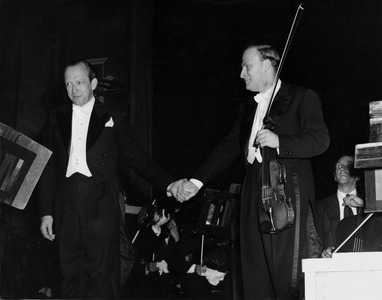 Second World War (1939-1945) - World War II (WWII or WW2): Berlin (Germany) 1st July 1948: After a concert at the Palast, the famous violinist Yehudi Menuhin shares the applause with German conductor Ludwig Leopold. This is the second time that Yehudi Menuhin has given a concert in Germany since the end of the war.