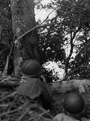 Image of Marines pinned down behind gravestones by Japanese snipers ...