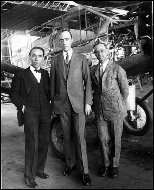 Port Richmond (Staten Island) USA 23 November 1927: In the Bellanca aviation factory, designer Giuseppe Bellanca (1886-1950) (left), A.R Martine and pilot Roger Q.Willams (1894-1976) pose in front of the aircraft “Dream Ship” under construction