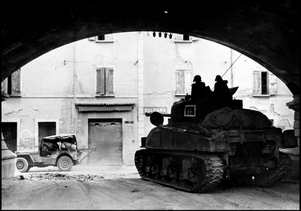 WWII:Bologna (Italy) April 22, 1945: A Sherman M4 tank of a South African division roams the city