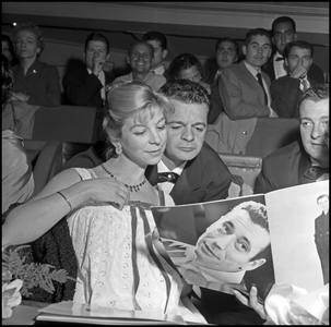 Serge Reggiani and his wife Annie Noel at Yves Montand's show at the Etoile, Paris, 1958 (b/w photo)
