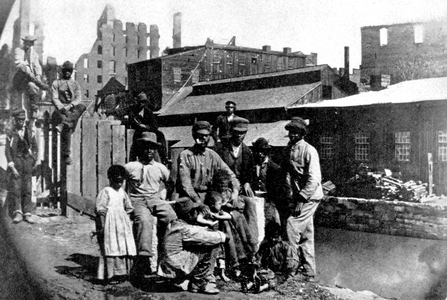 A group of black residents of Richmond shortly after the evacuation of Confederate troops, 1863 (b/w photo)