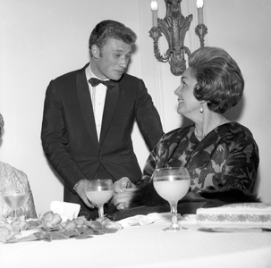 Johnny Hallyday and Begum Om Habibeh Aga Khan, Cannes, 1962 (b/w photo)