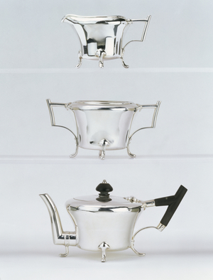 Three-piece tea service, designed in 1878, made by Hukin & Heath (electroplate & ebony)