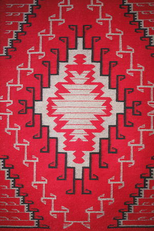 Indian tapestry from North America. Navajo tribe. Textile Creation. Museum of Indian Culture of North America, Phoenix, Arizona, USA