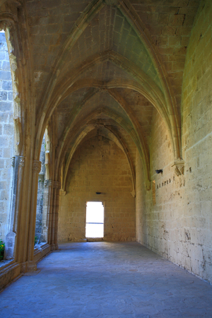 South walk of the Cloister in Bellapais Abbey, or “” The Abbey of Peace”” (from English: Abbaye de la Belle Paix) Ruins of a monastery built by Canons Regular in the 13th century Kyrenia Region (Girne) North of Cyprus (Turkey)