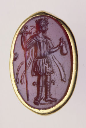 Intaglio set in a gold ring depicting young male figure, 2nd century BC (gold & sard)