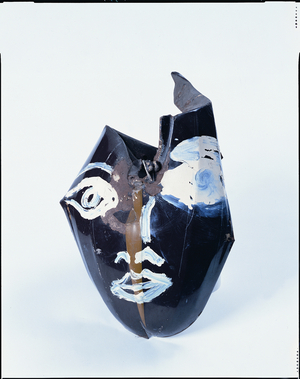 Head (oil paint on motor bicycle tank)