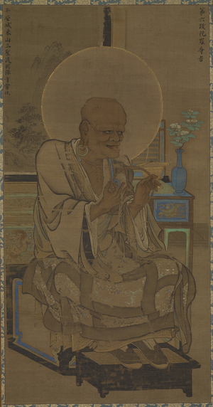 Arhat (Hattara Sonja - Bhadra) seated; a flowering branch in a vase on the table, Nanbokucho period, mid-14th century (ink and colour on silk)