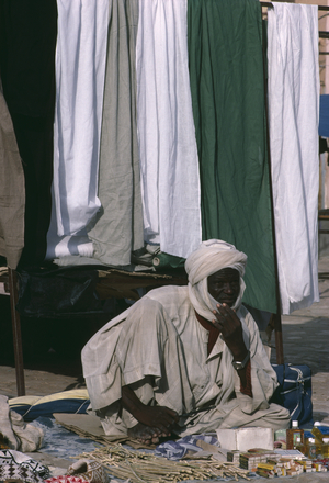 Vendor on the market place (photo)