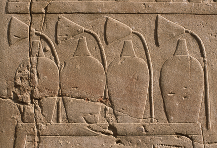Detail of a relief depicting jars and lotus flowers (limestone)
