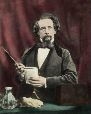 Charles Dickens (1812-1870) during a reading around 1860.