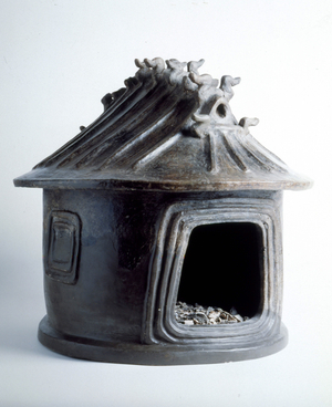 Etruscan burial urn in the shape of hut
