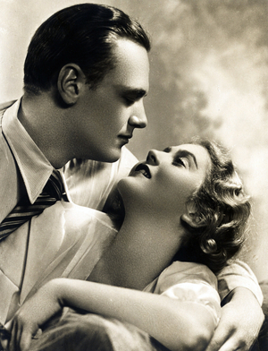 French card for Valentine's Day: a couple of lovers kissing. 1930 approx.