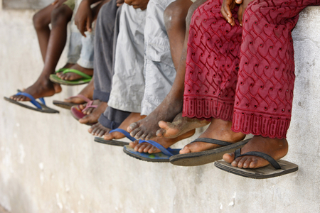 African schoolchildren's slippers, Lome, Togo