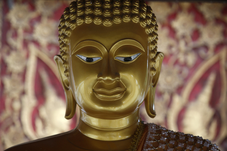 Detail of a Buddha statue in Wat Pan Ping, Chiang Mai. Thailand